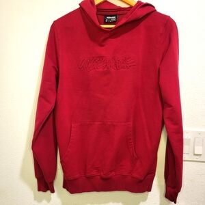 Red hoodie sweater by Unspeakable